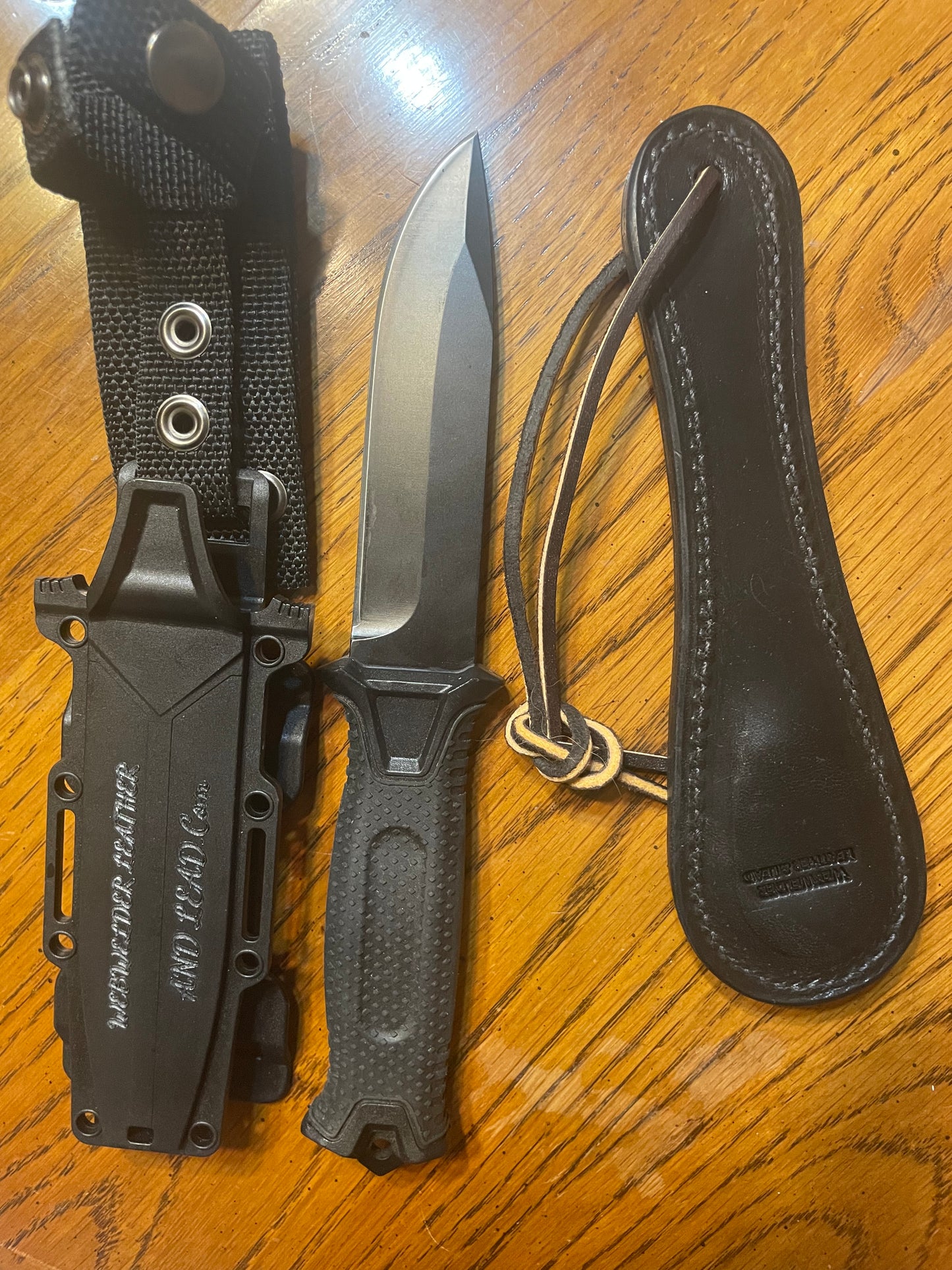 Unsprung black medium Sap tactical knife